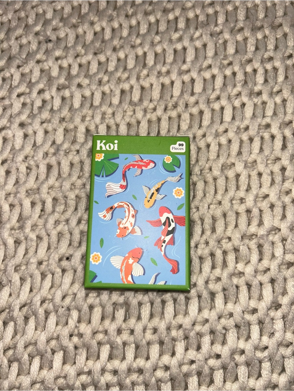 Koi Kids Puzzle with Blue, Green, Red and Orange Artwork